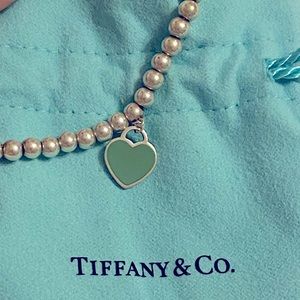 Beautiful Tiffany bracelet with pouch and box.
